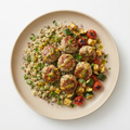Meddeterraean meatballs on a bed of grains